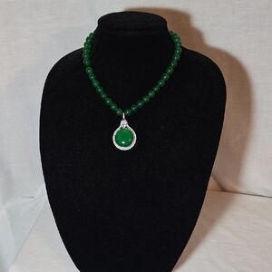 Elegant Green Beaded Necklace with Silver Pendant